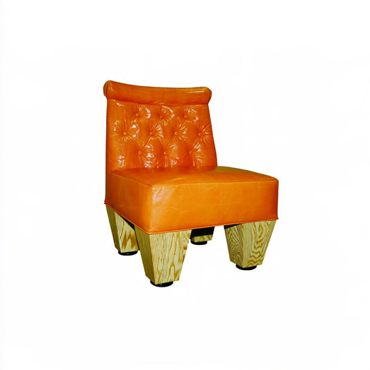 Thestudyandstool cognac brown leather dining chair with upholstered seat and back, shown from a side angle.